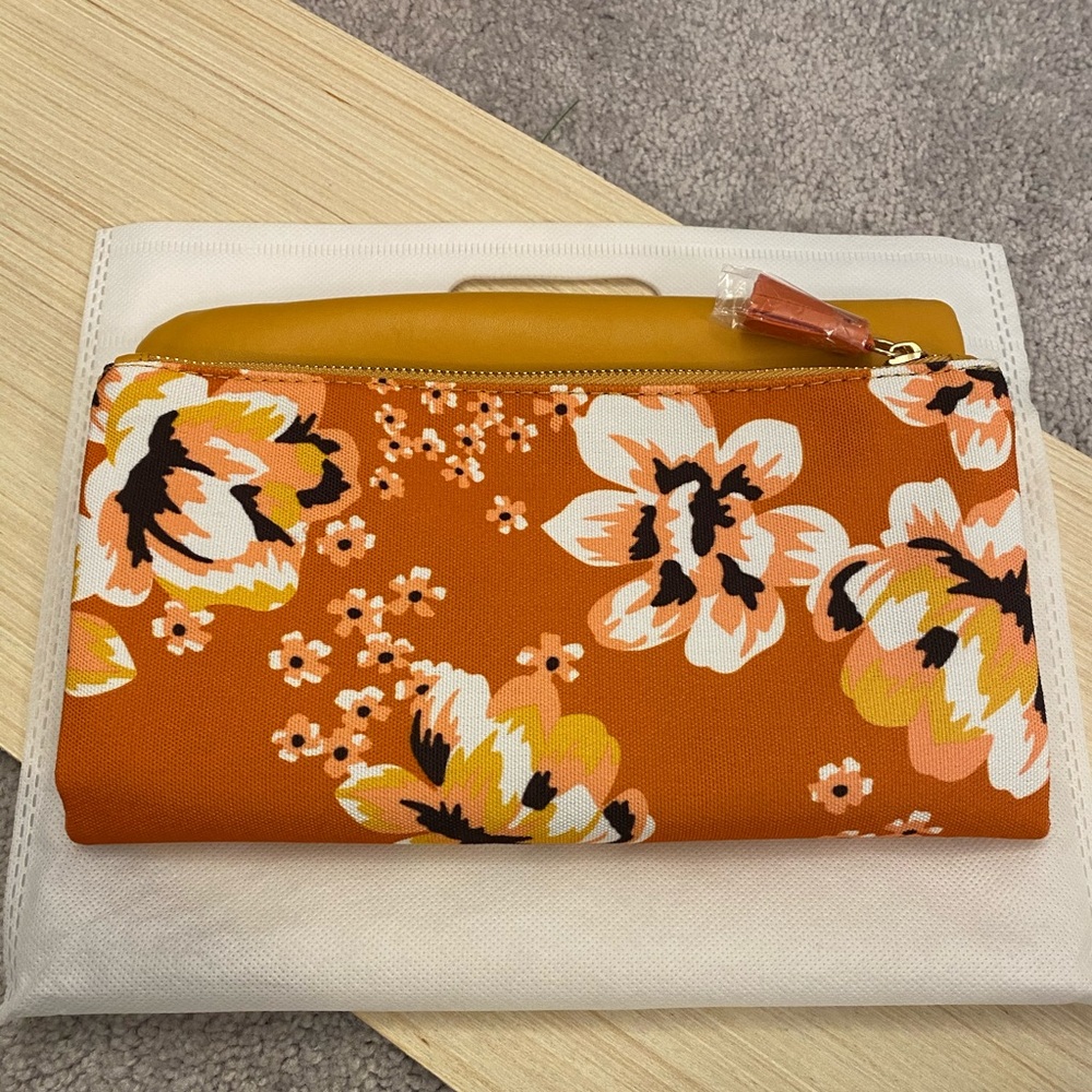 Rachel Pally reversible folding clutch